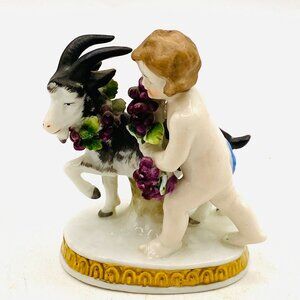 Antique Chelsea Porcelain Figurine: Cherub with Goat & Grapes